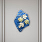 Tralcio d'uva: scultura in ceramica con dorature