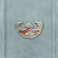 Oscillum, scultura in terracotta dipinta in rosso