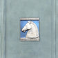 Testa di Cavallo, scultura in terracotta dipinta in azzurro