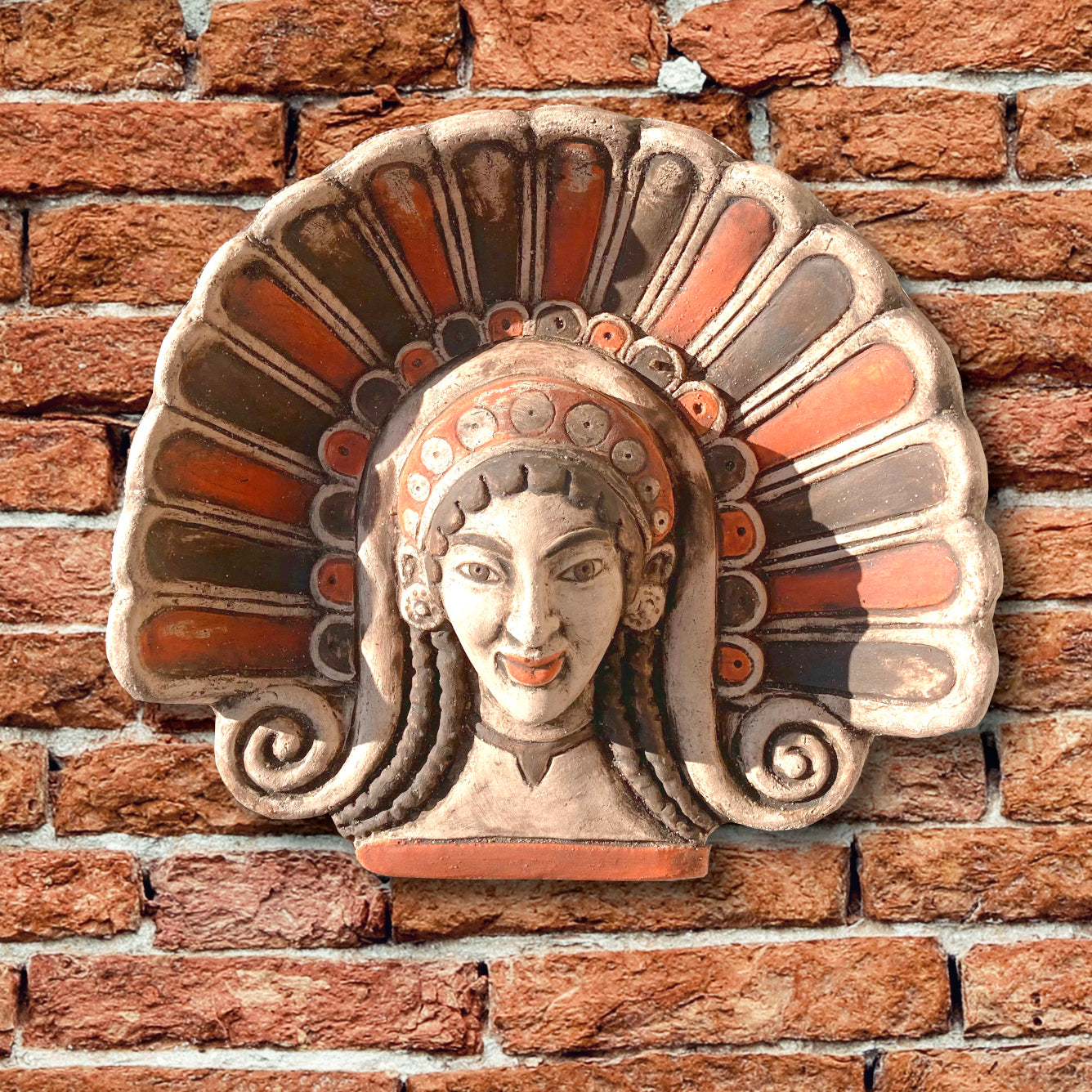 Antefissa con Testa di  Menade, terracotta dipinta